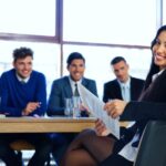 women in leadership - woman at table